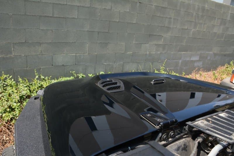 DV8 Offroad 10th Anniversary Vented Hood for 2007-2018 Jeep Wrangler Paintable - Image 4
