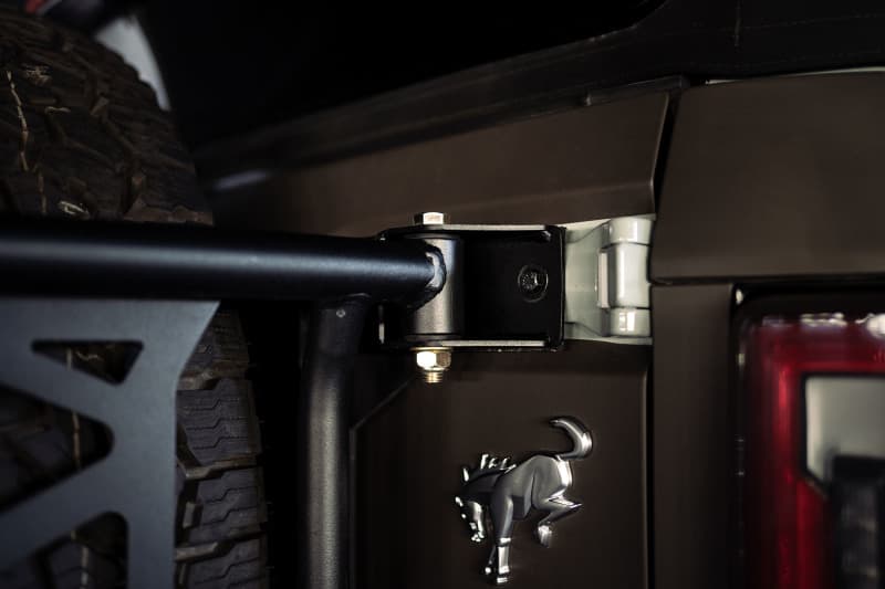 DV8 Offroad Bronco Spare Tire Guard for Tailgate Reinforcement and Gear Mount - Image 4