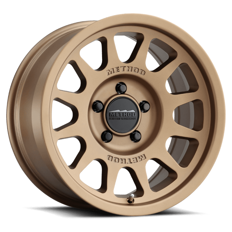 Method Wheels MR703 15x7 5x100 56.1mm CB Bronze Wheel
